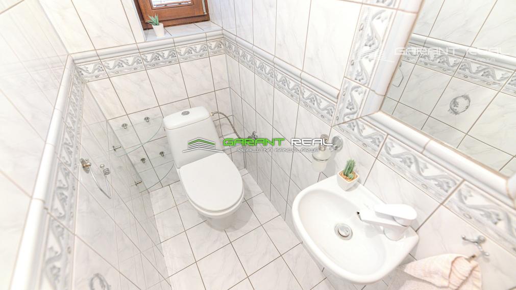 GARANT REAL - PRIESTRANNÝ TEHLOVÝ RODINNÝ DOM V TICHOM PROSTREDÍ S INVESTIČNÝM POTENCIÁLOM – PODHORANY